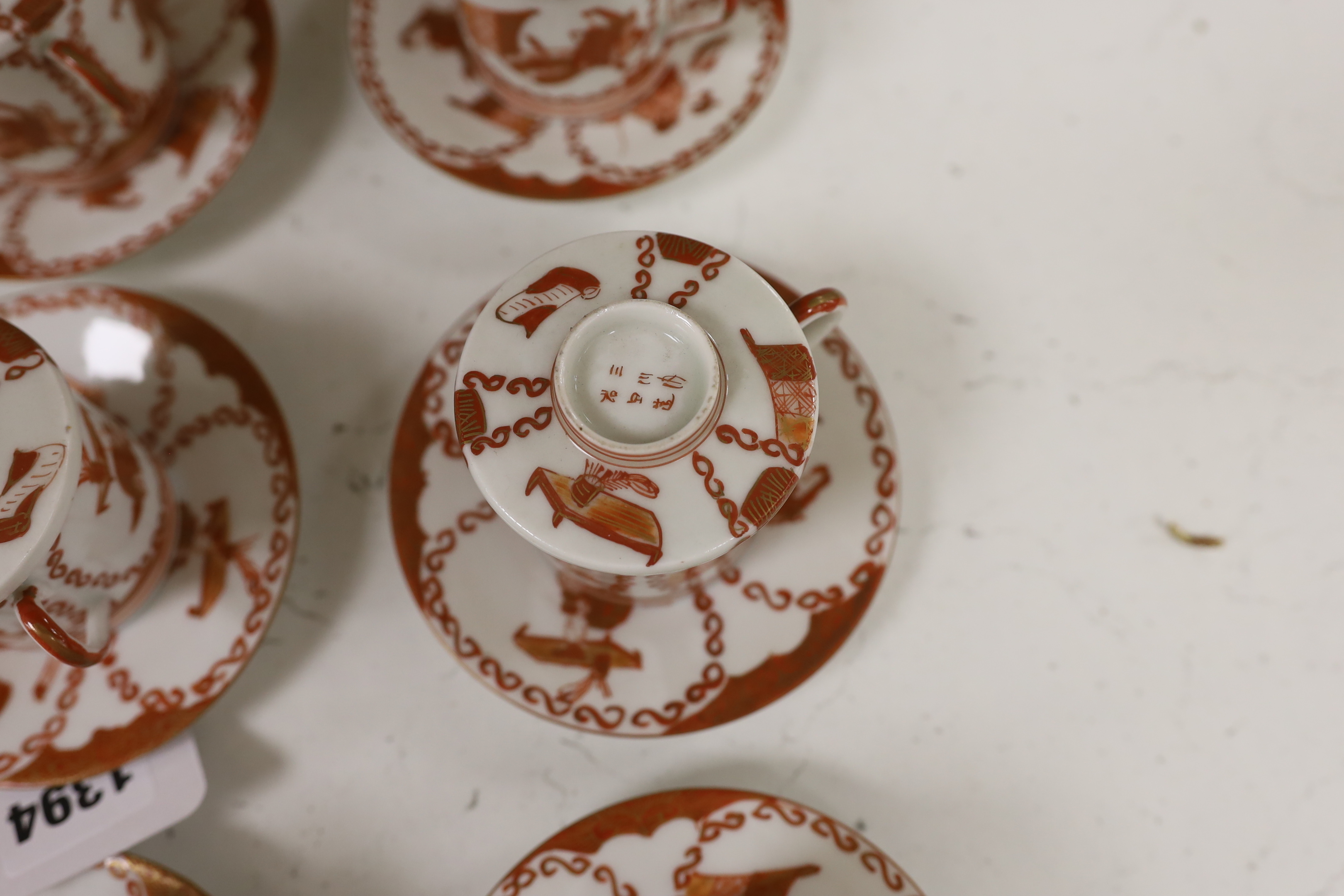 A Japanese Kutani Sake set, twelve cups, covers and saucers and two spare saucers